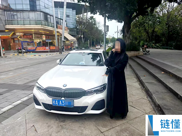 广西一宝马女司机开车总喜好遮脸 交警一查真有事：罚款1000元、行拘5日